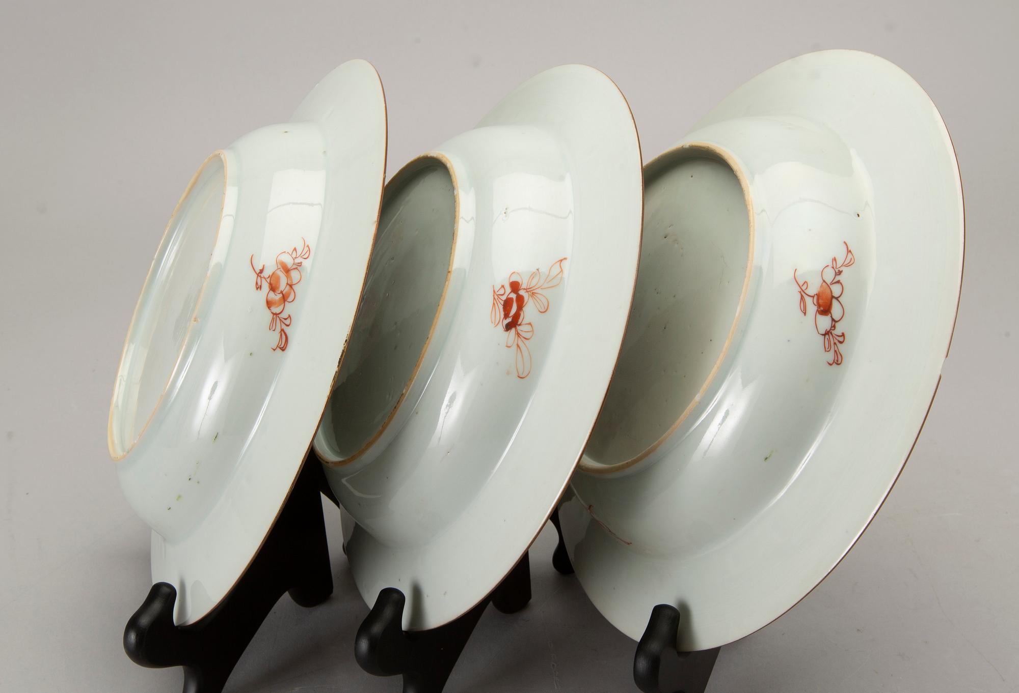 A set of four Chinese famille rose Qianlong porcelain plates.