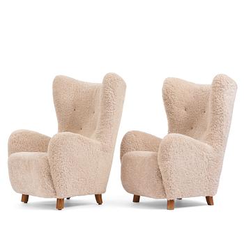 359. Mogens Lassen, attributed to, a pair of easy chairs, Denmark 1940s.