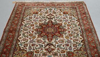A rug, Old Tabriz, part silk, ca204 x 152 cm.