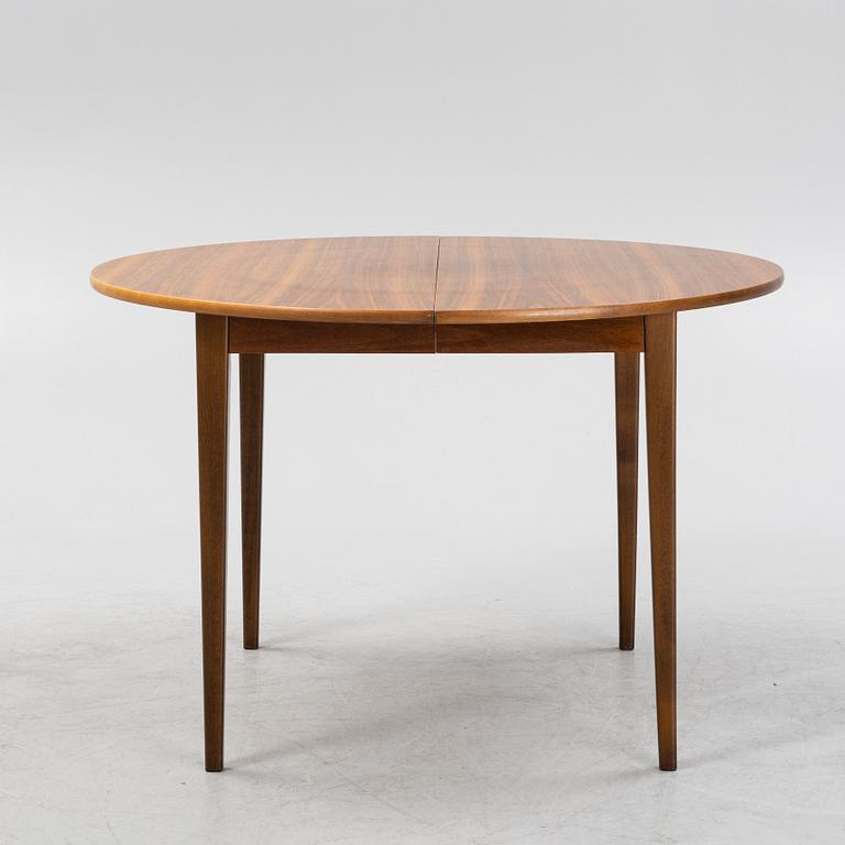 A walnut dining table, 1960's.