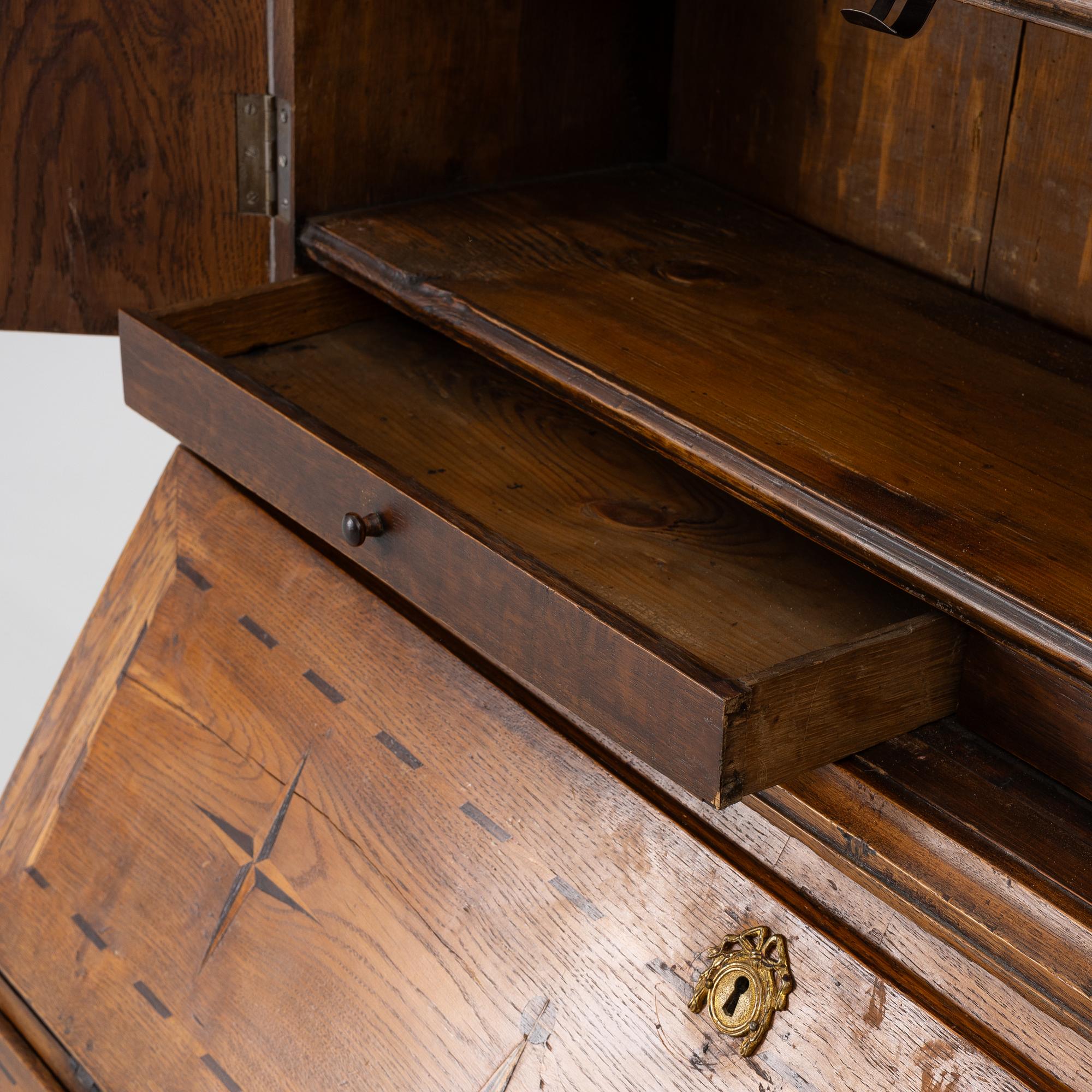 A writing cabinet, 18th Century.