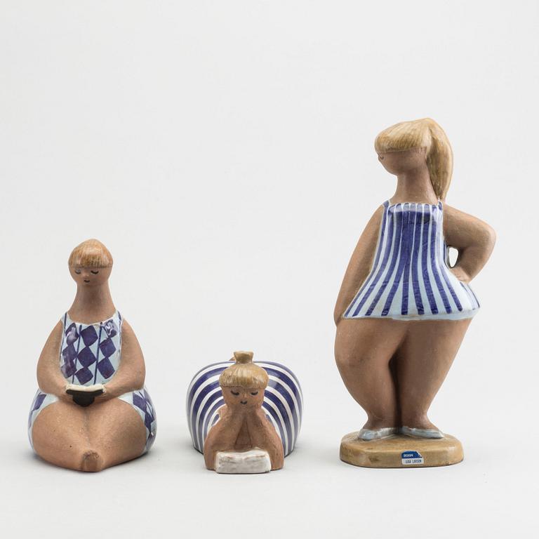 LISA LARSON, a set of three signed ceramic figurines.