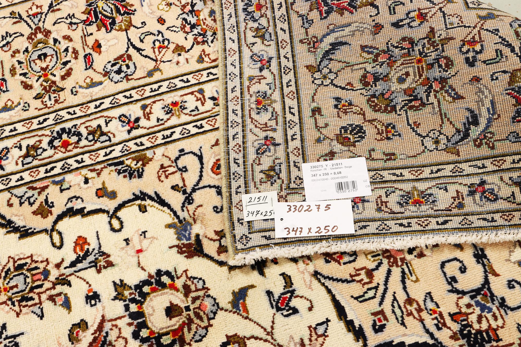 A Keshan carpet, c. 347 x 250 cm.