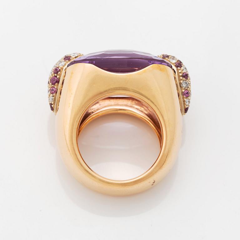A Pomellato ring set with amethysts and round brilliant-cut diamonds.