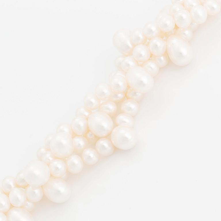 A cultured freshwater pearl necklace and bracelet.