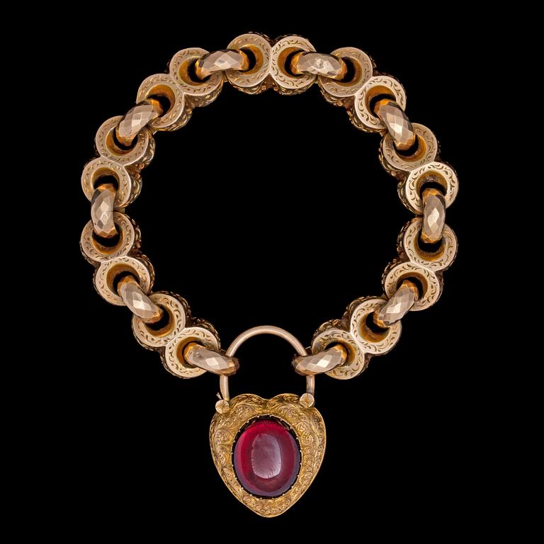 A cabochon cut garnet and gold bracelet, 19th century.