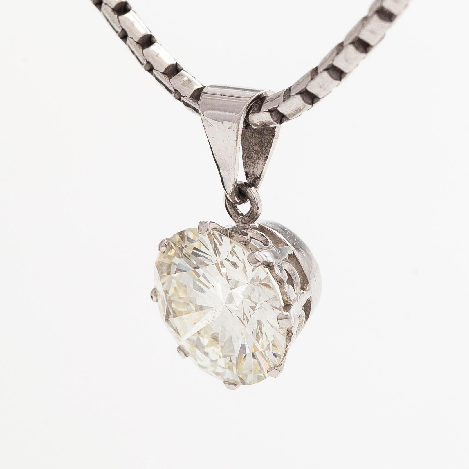 Riipus, briljanttihiottu timantti 3,60 ct, 18K valkokultaa.