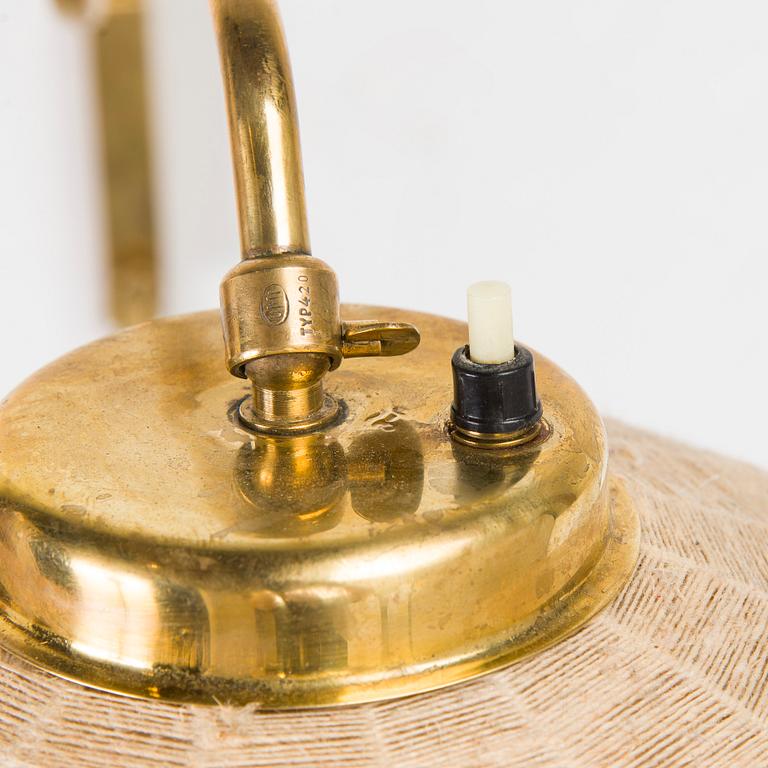 A mid-20th century wall light for Valinte, Finland.