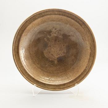 A celadon ge glazed dish, South East Asia, presumably Sawankhalok, 15th/17th Centuyr.