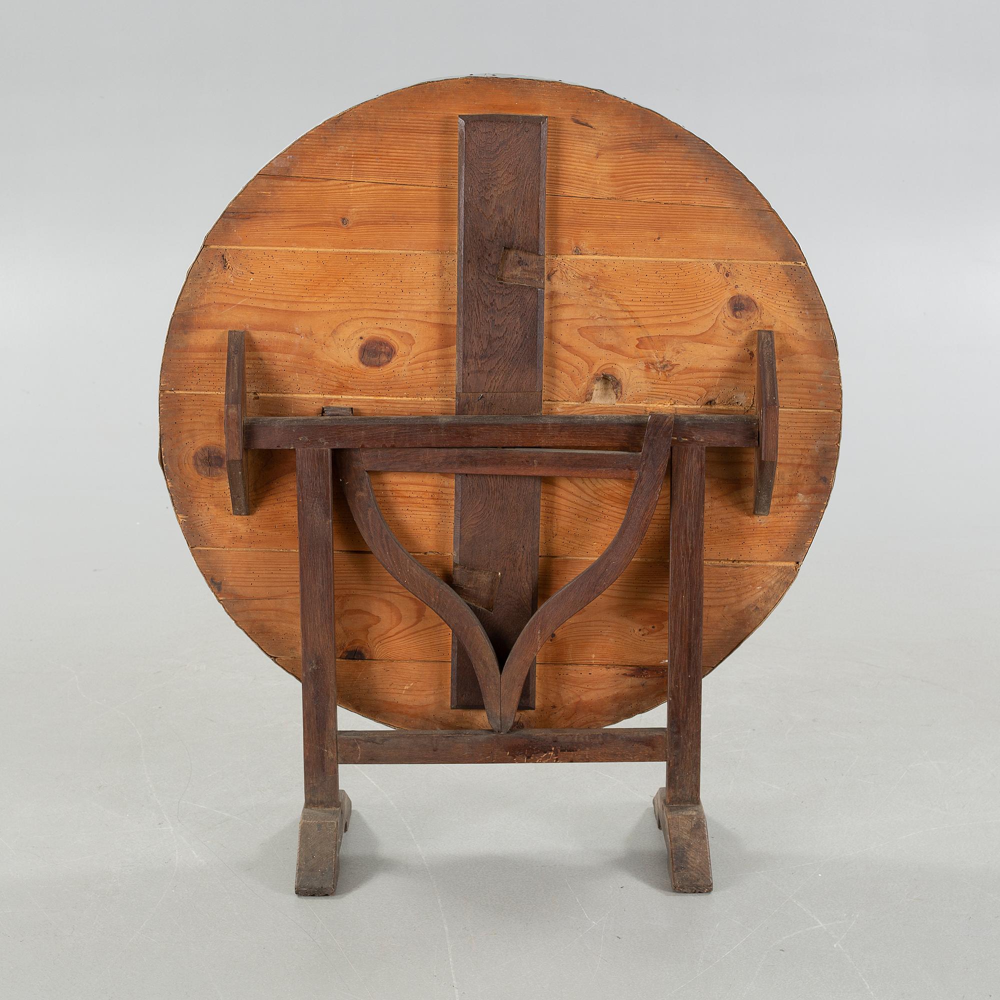 A folding table, a so called wine testing table from the early 20th century.