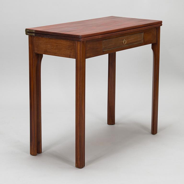 An 19th century game table England.