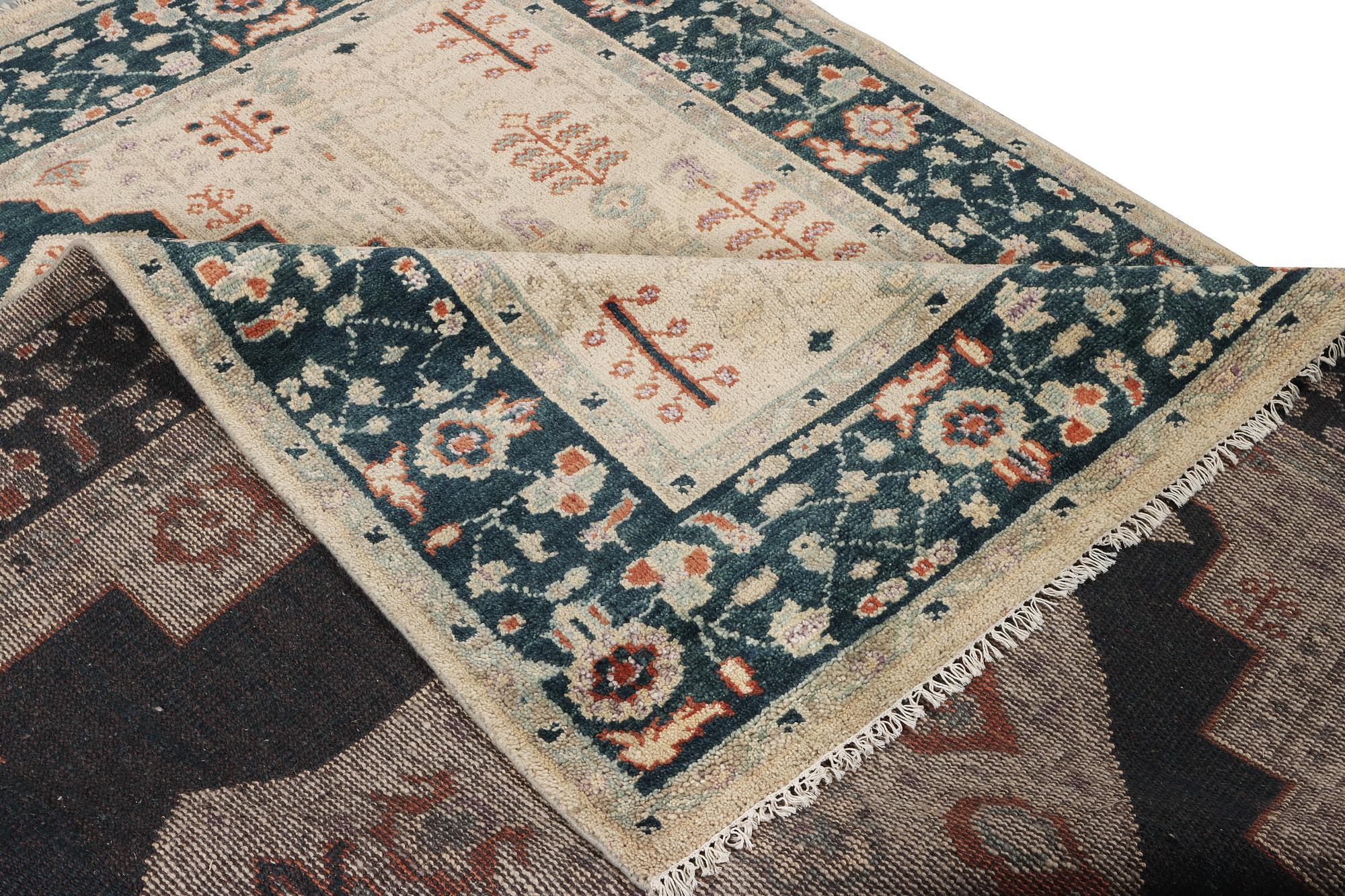 An oriental carpet with Mamluk design, c. 307 x 237 cm.