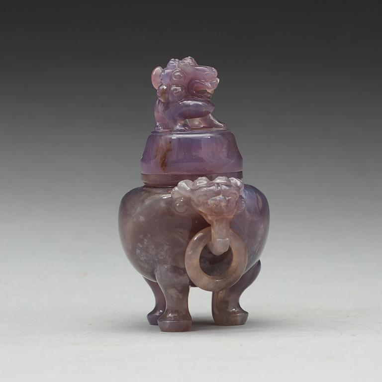 An amethyst tripod censer with cover, China, early 20th Century.