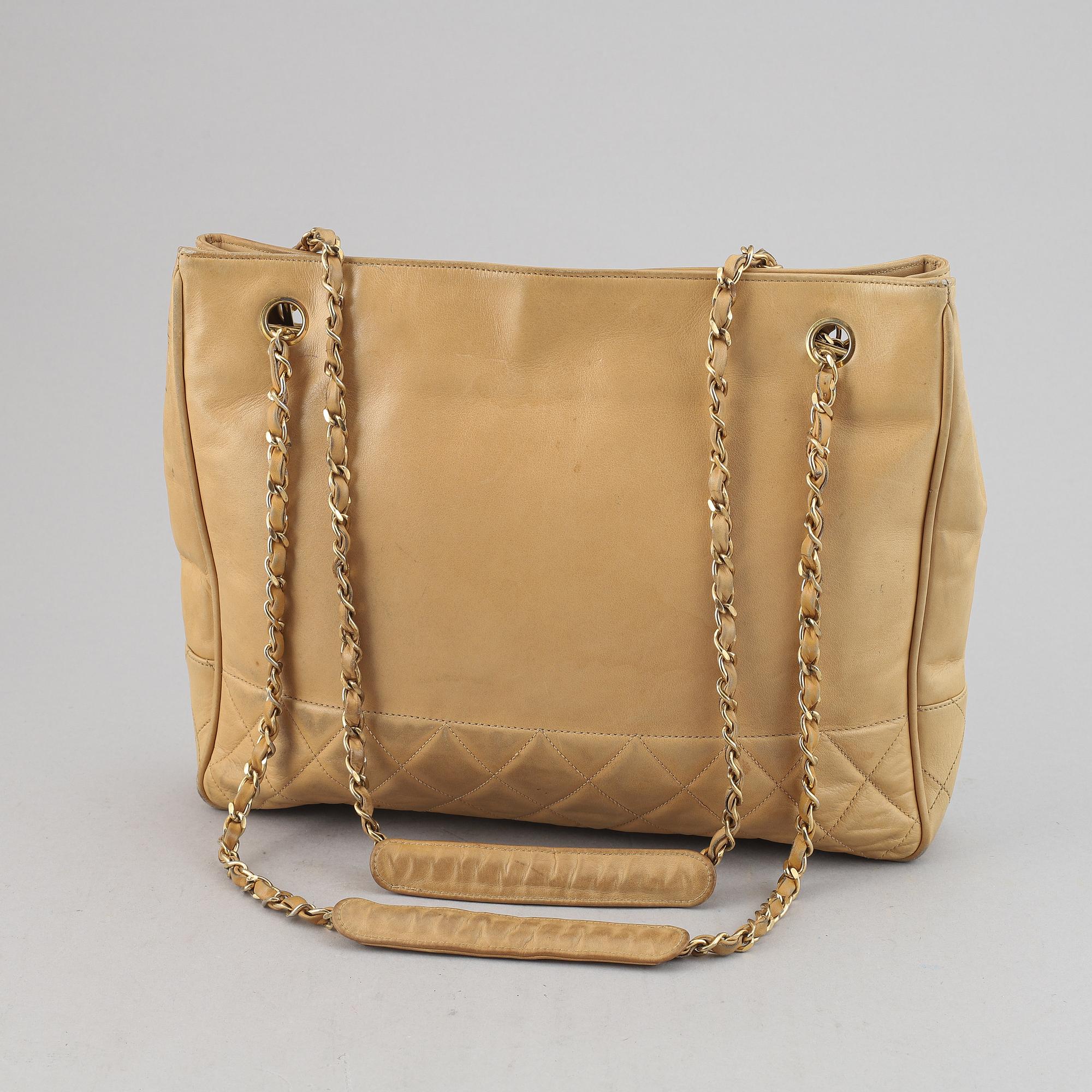 Chanel, a beige leather handbag, 1986-1988.