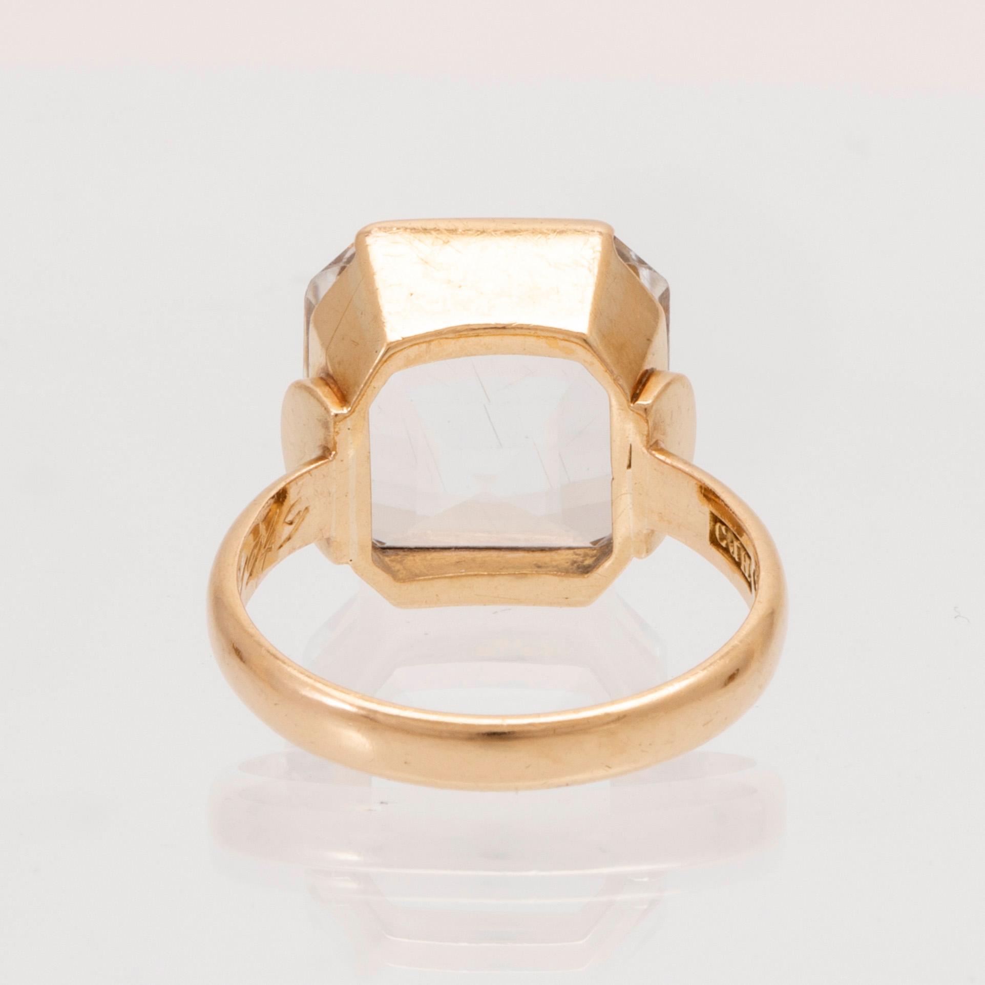 Ring och örhängen 18K guld samt fasettslipade bergskristaller.
