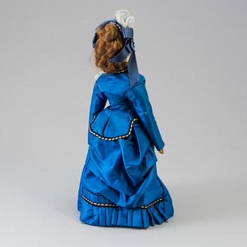 A bisque head fashion doll, probably France, late 19th century.