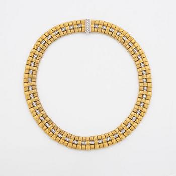An 18K gold necklace set with round brilliant-cut diamonds.