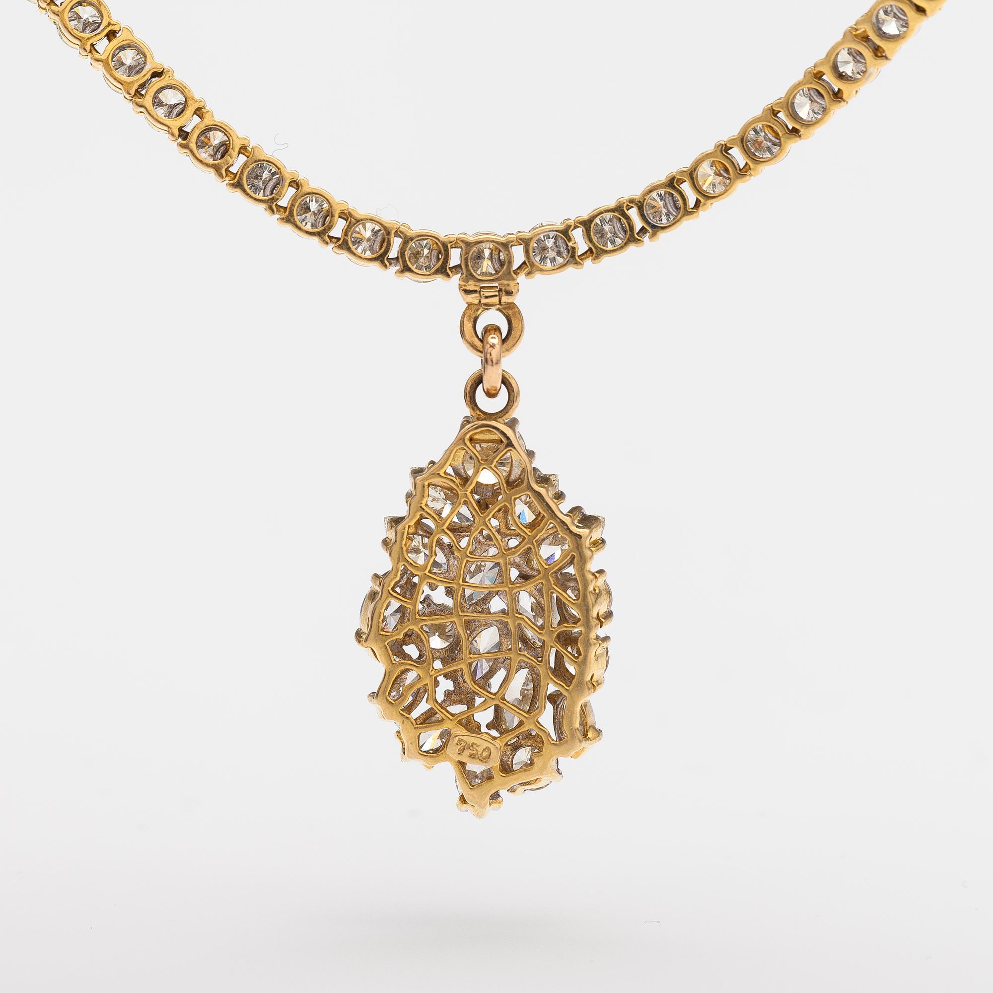 An 18K gold necklace with brilliant and marquise cut diamonds ca. 13.56 cts in total.