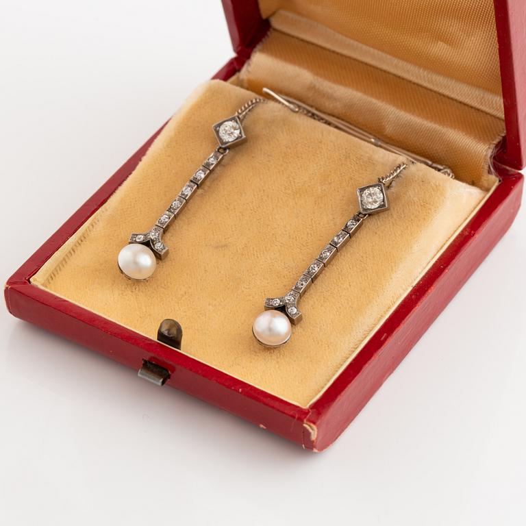 A pair of 18K gold and cultured halfpearl and diamond earrings.
