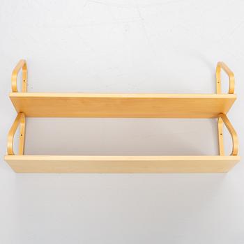 Alvar Aalto, a pair of wall shelves, model 112B, Artek, Finland, late 20th century.