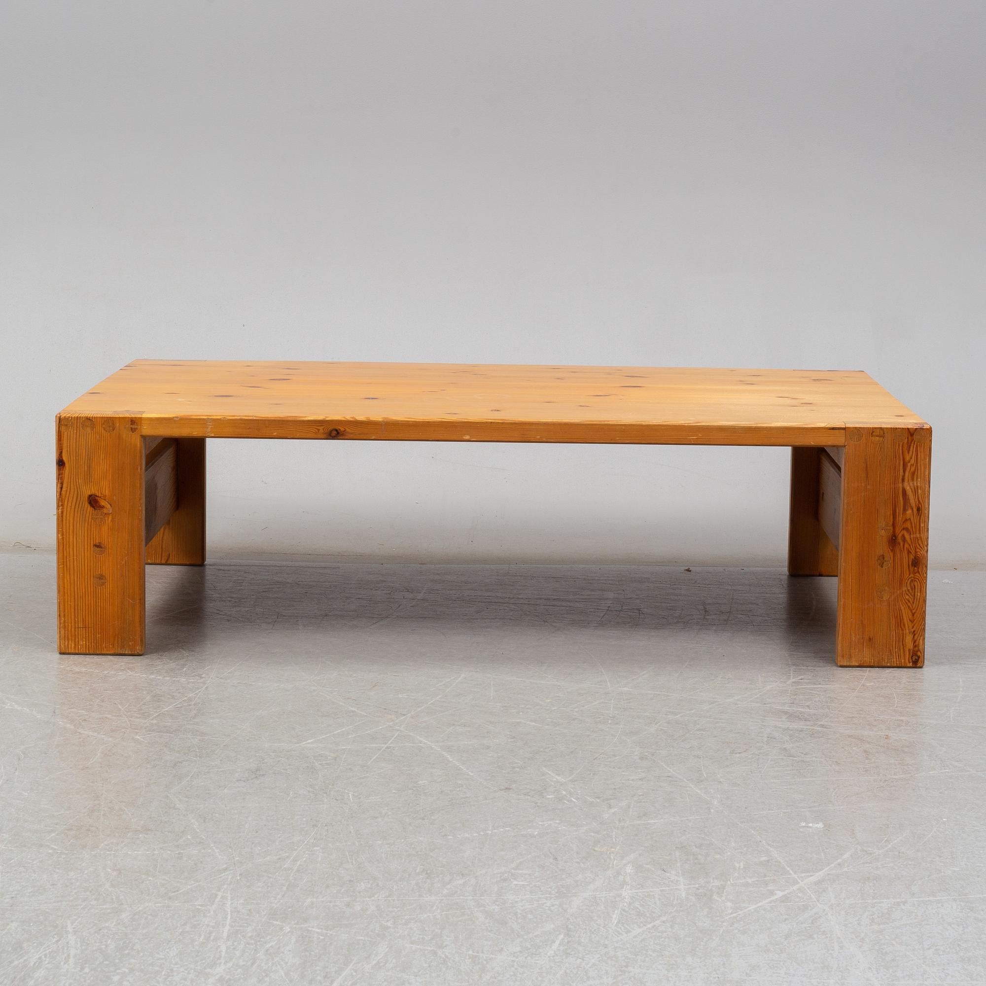 A 1960s pine coffee table.