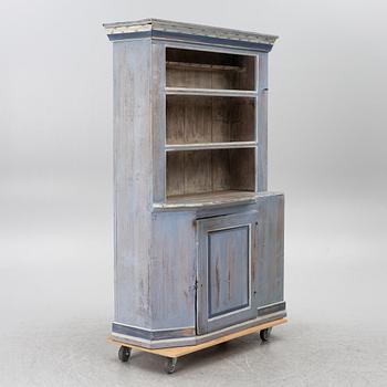 A painted folk-art cupboard, early 19th century.