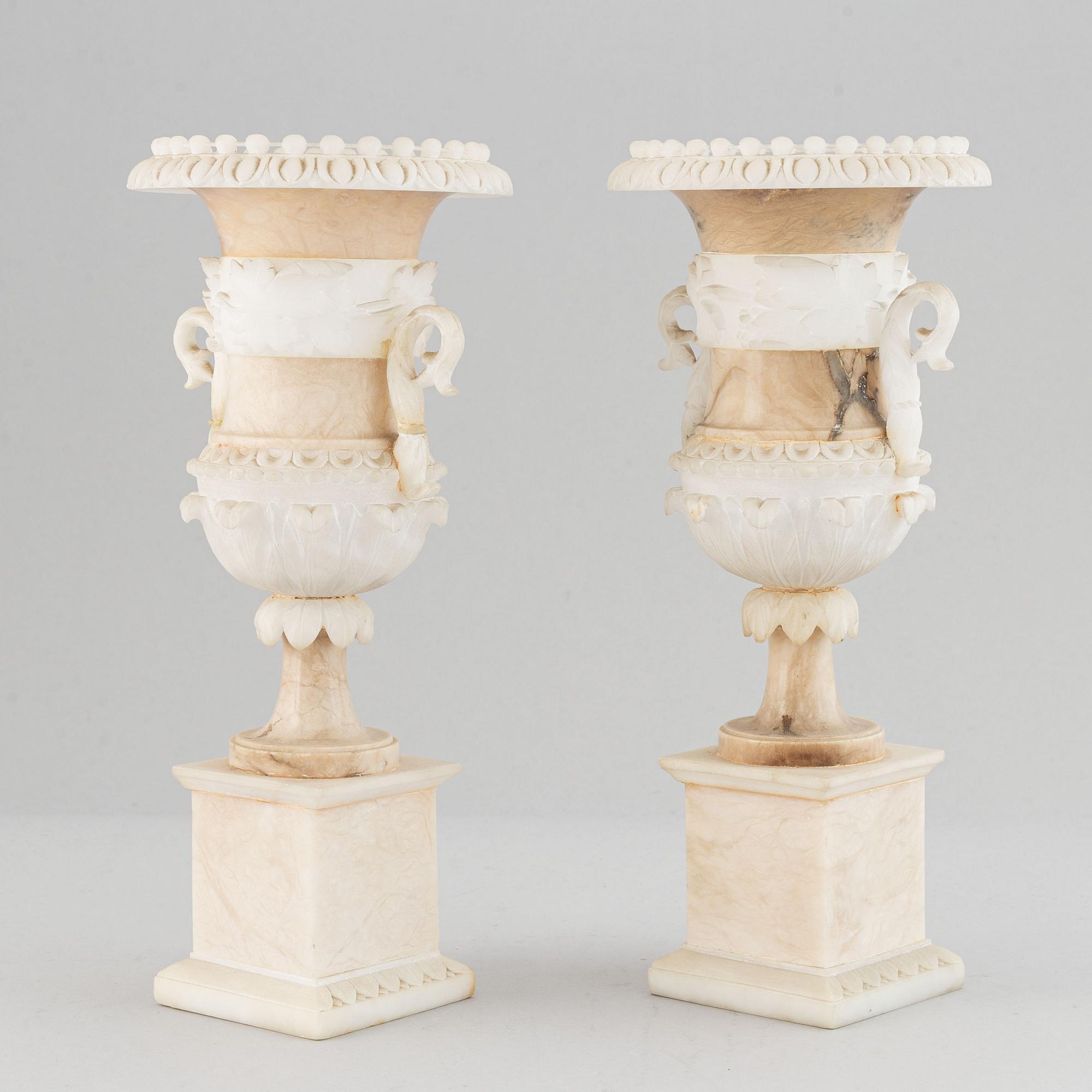 A pair of 20th century alabaster vases.