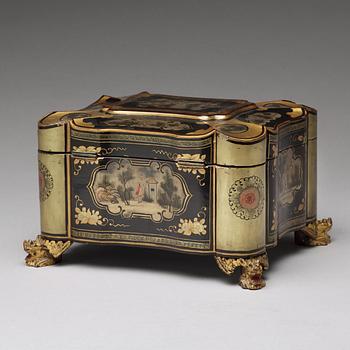 A Canton lacquer tea box with a pewter liner, Qing dynasty, 19th Century.