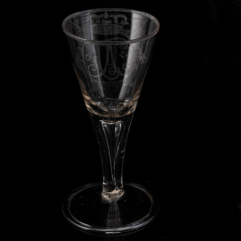 A wine glass with the monogram of the Swedish king Adolf Frederick, 18th Century.