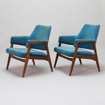 A pair of mid 20th century armchairs.