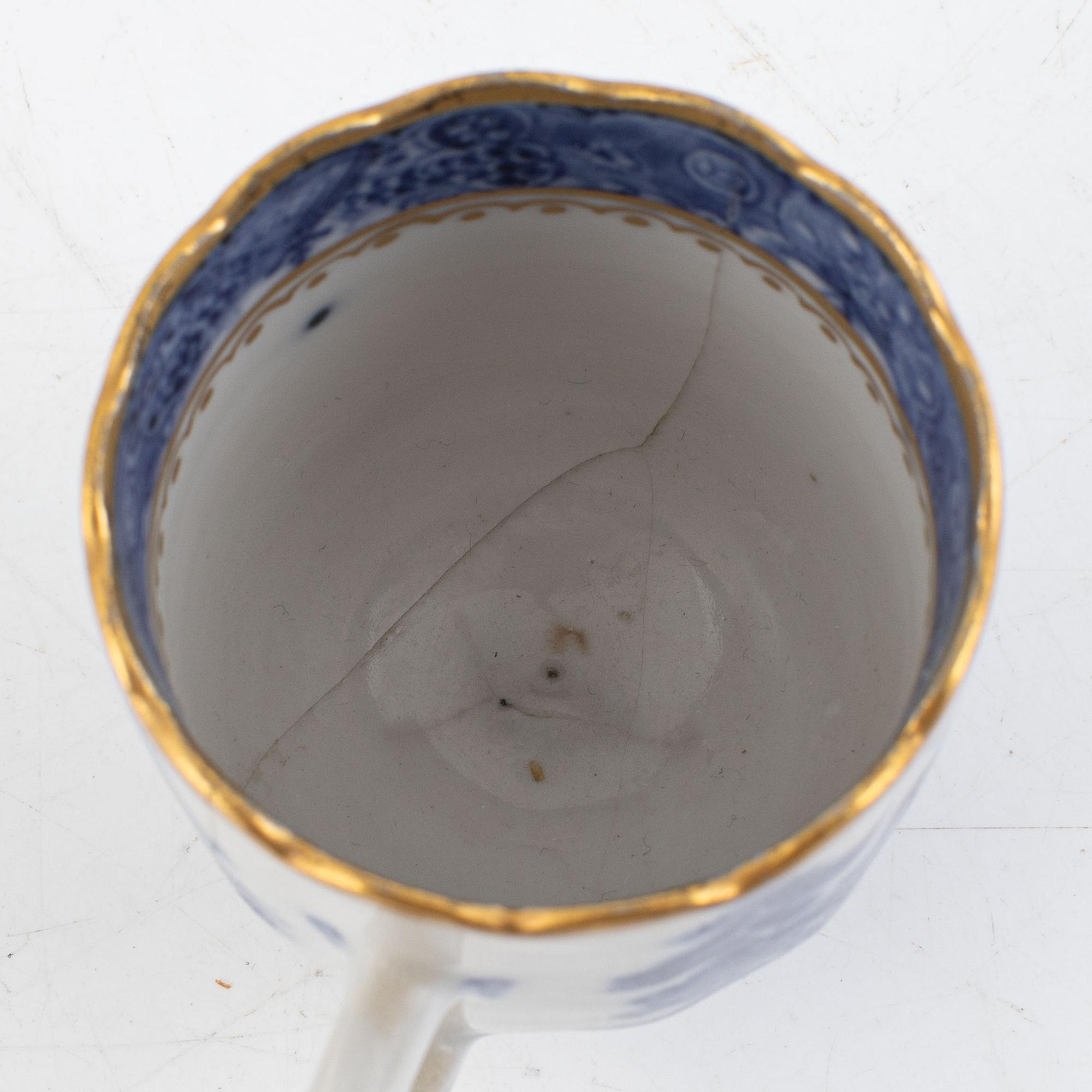 A small Chinese export tureen with cover, two cups, a saucer and a jug with cover, Qing dynasty, 18th century.