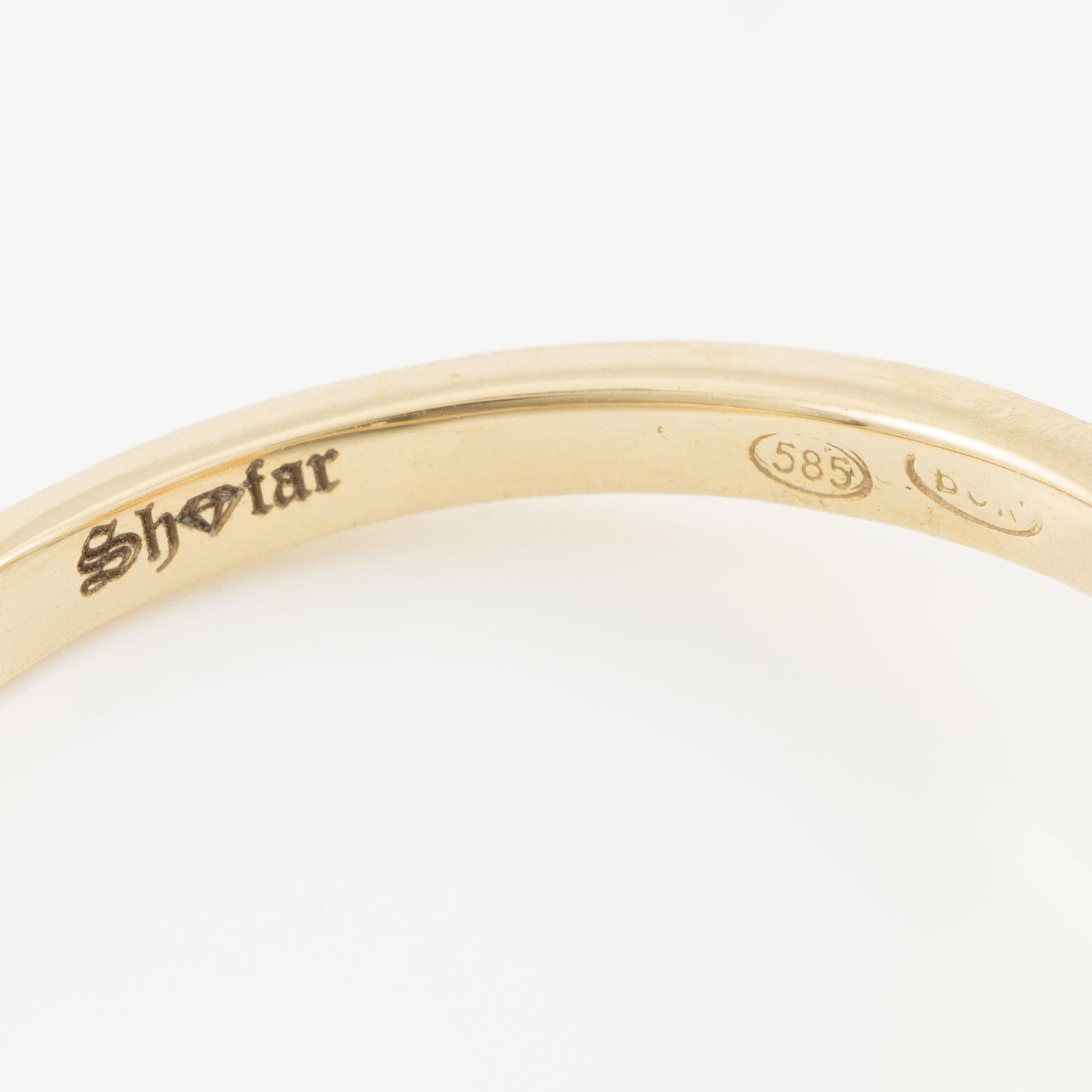 Ring, carved, 14K gold with pink sapphire and brilliant-cut diamonds.