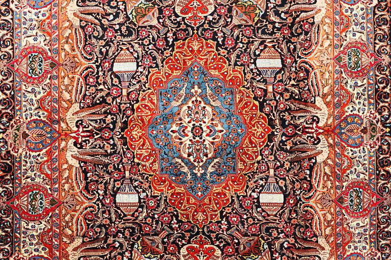 A Kashmir carpet, a. 390 x 305 cm.