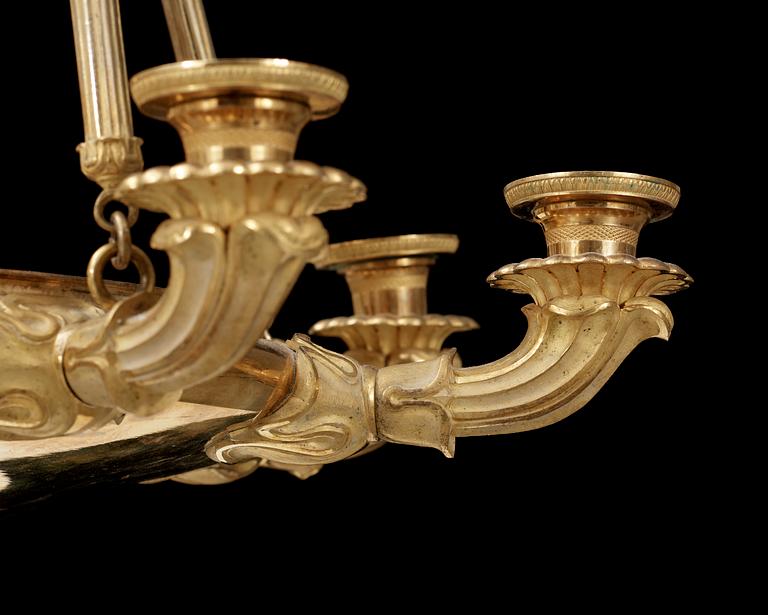 An Empire early 19th century gilt bronze eight-light hanging lamp.