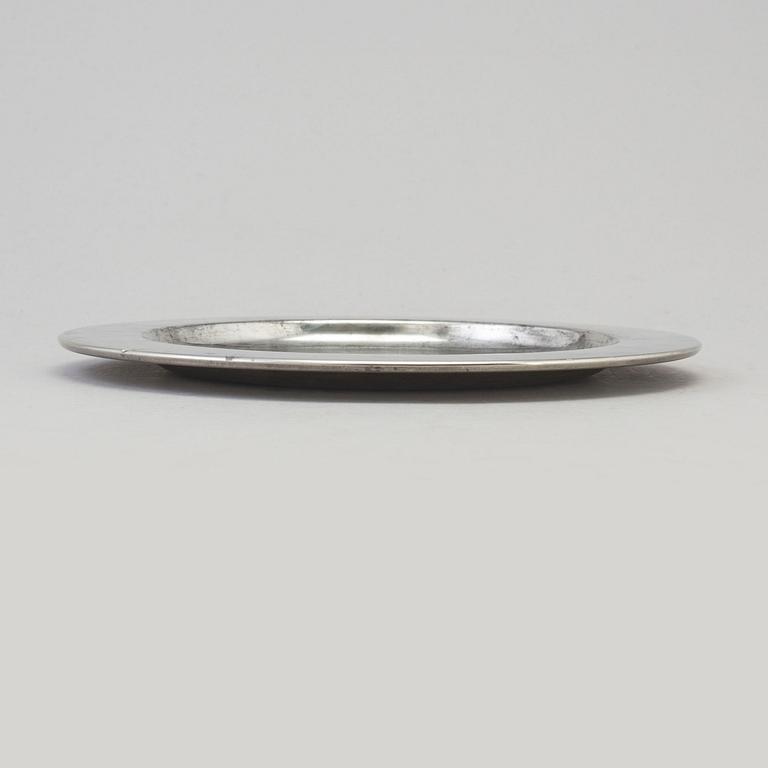 A set of seven 1960s pewter plates by Firma Svenskt Tenn.