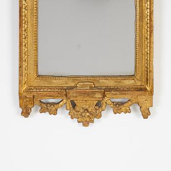 A Gustavian mirror by Johan Åkerblad, master in Stockholm 1758-99), signed.