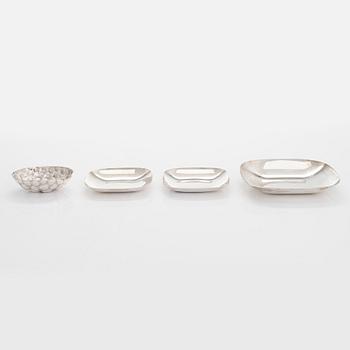 Tiffany & Co MAKERS, a four piece set of sterling silver bowls, salt and pepper shakers by other maker.