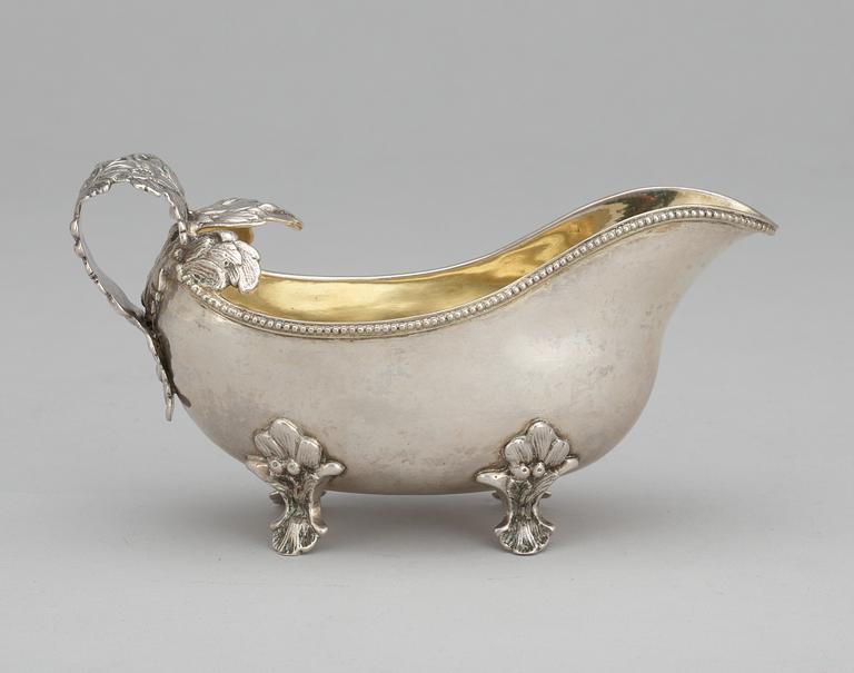 A Swedish 18th century parcel-gilt cream-jug, makers mark of Anders Schotte, Uddevalla 1797.