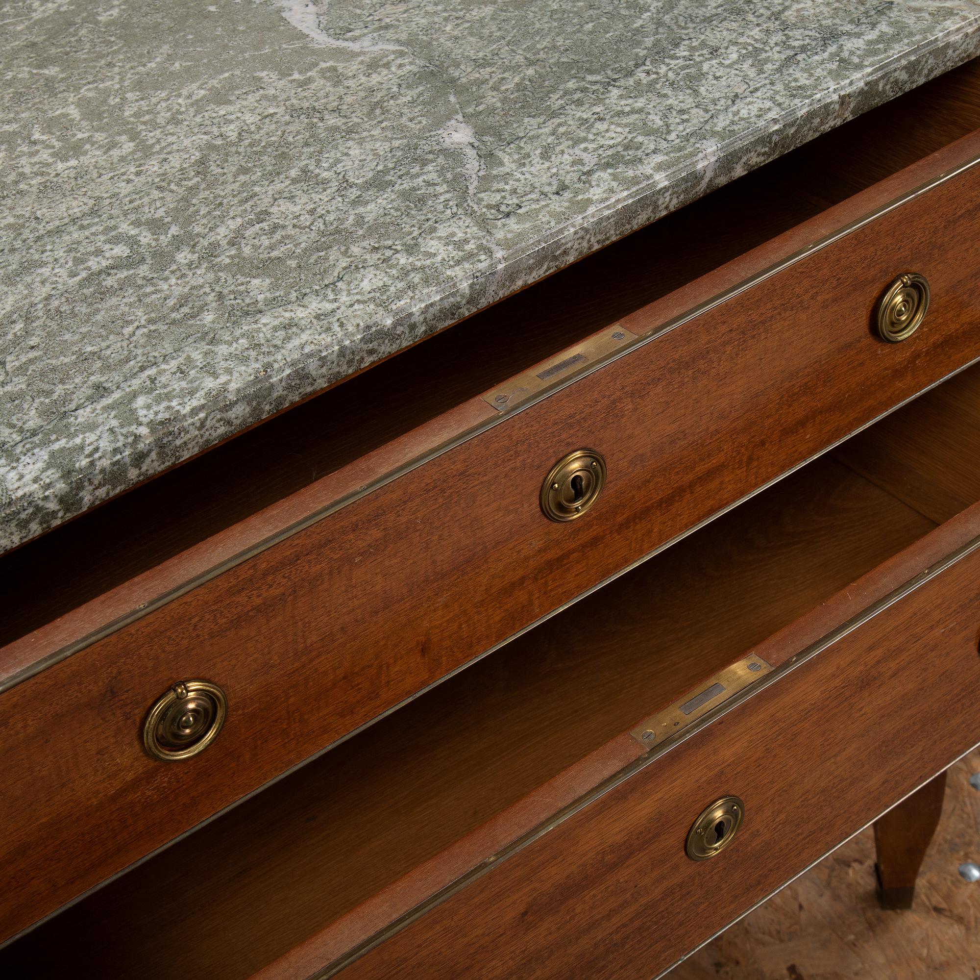 A gustavian style chest of drawers from the second half of the 20th century.