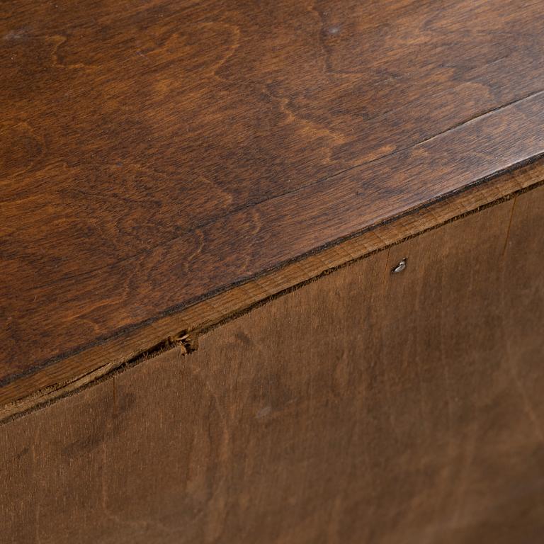 A stained birch chest of drawers, 1930's.