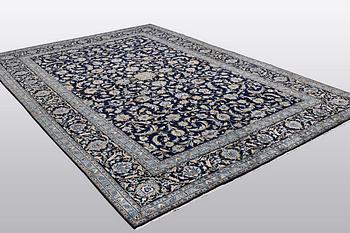 A carpat, Kashan signed Reza Torshi, ca 370 x 250 cm.
