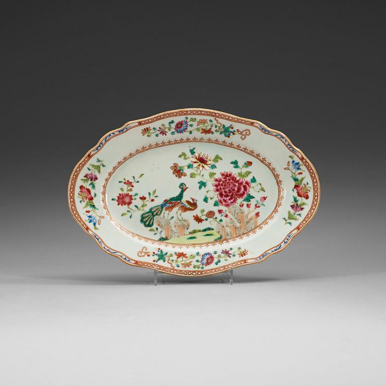 A famille rose 'double peacock' serving dish, Qing dynasty, Qianlong (1736-95).