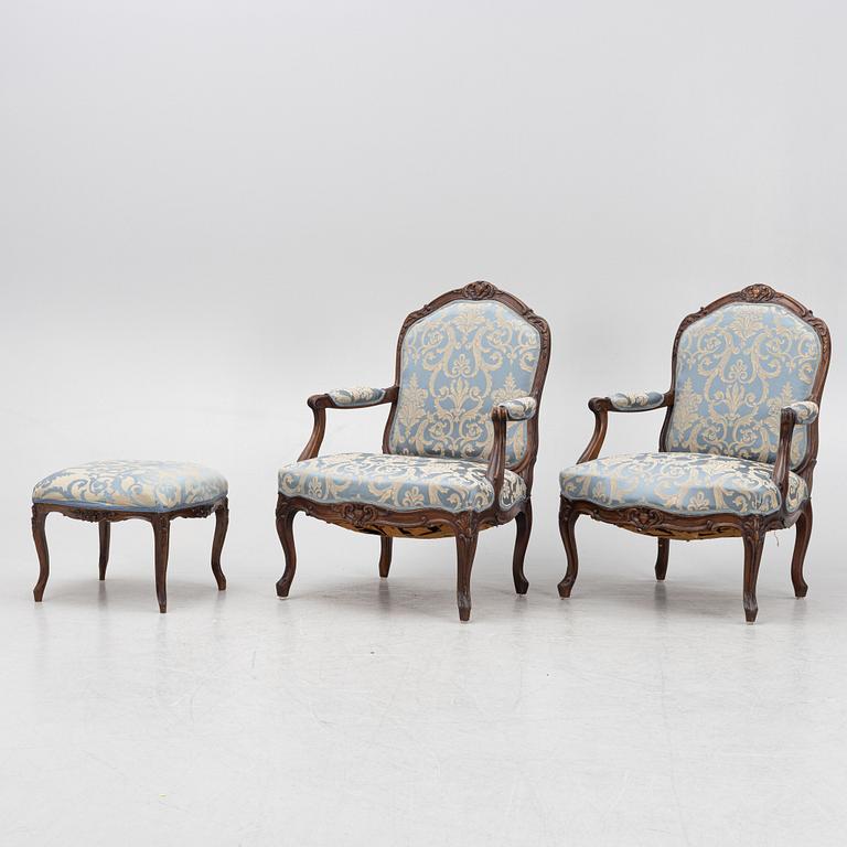Armchairs, a pair, and a stool, Rococo style and Rococo, circa 1900 and 18th century.
