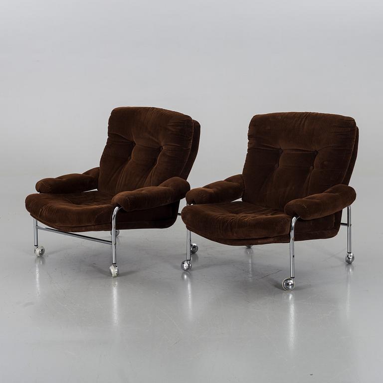 TWO 1970`S ARMCHAIRS.
