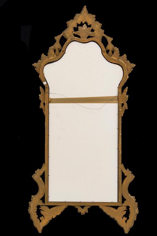 An mid 20th century Louis XV-style mirror from Paoletti, Firenze Italy.