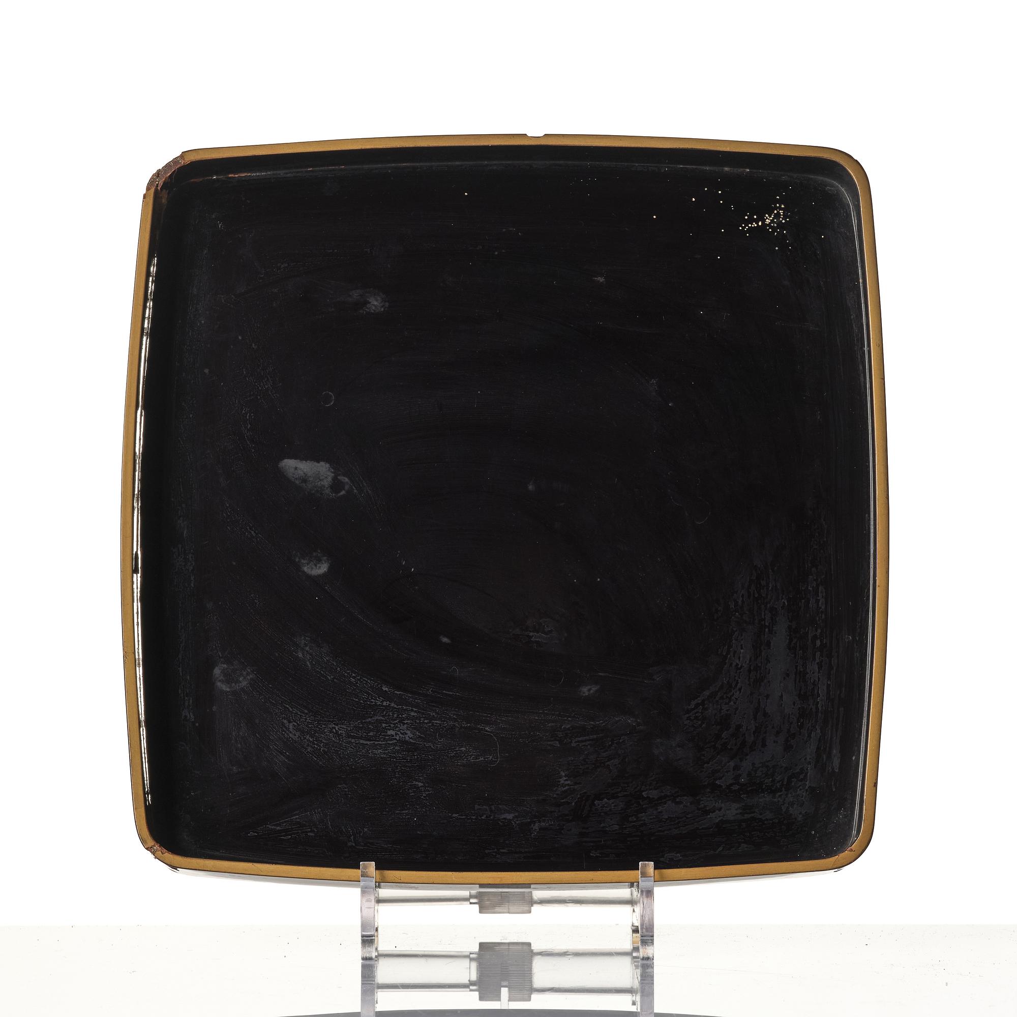 A Japanese lacquer tray and three Japanse wooden boxes.