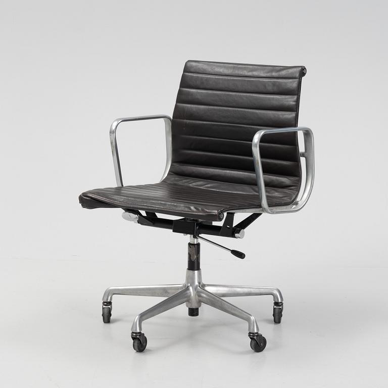 An EA 118 swivel office chair by  Charles and Ray Eames for Herman Miller, designed 1958.