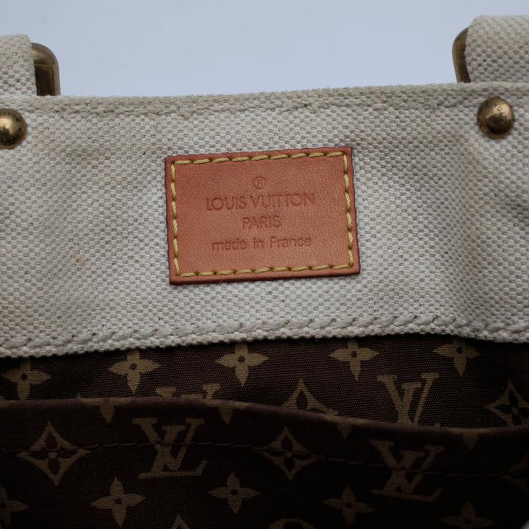LOUIS VUITTON, a "Globe Shopper Cabas MM" handbag.