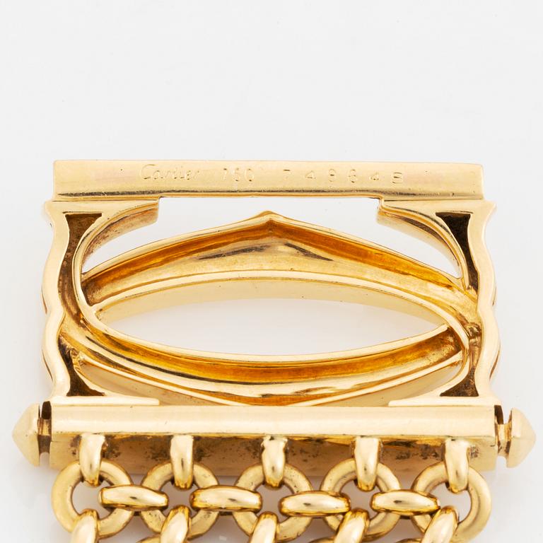 A Cartier 18K gold bracelet.