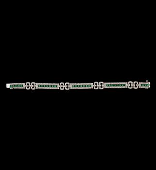 104. A diamond, 2.39 cts, and emerald, 2.61 cts, bracelet.
